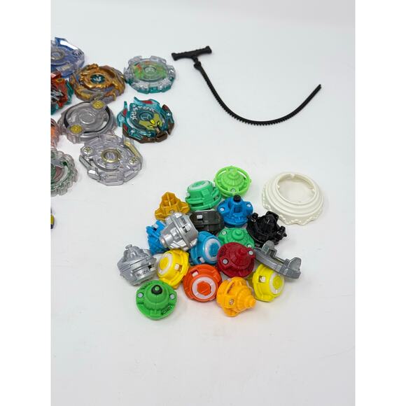 Set of 53 Pieces Beyblade Lot Burst Launchers Energy Drivers Discs Tips Metal - Picture 2 of 6